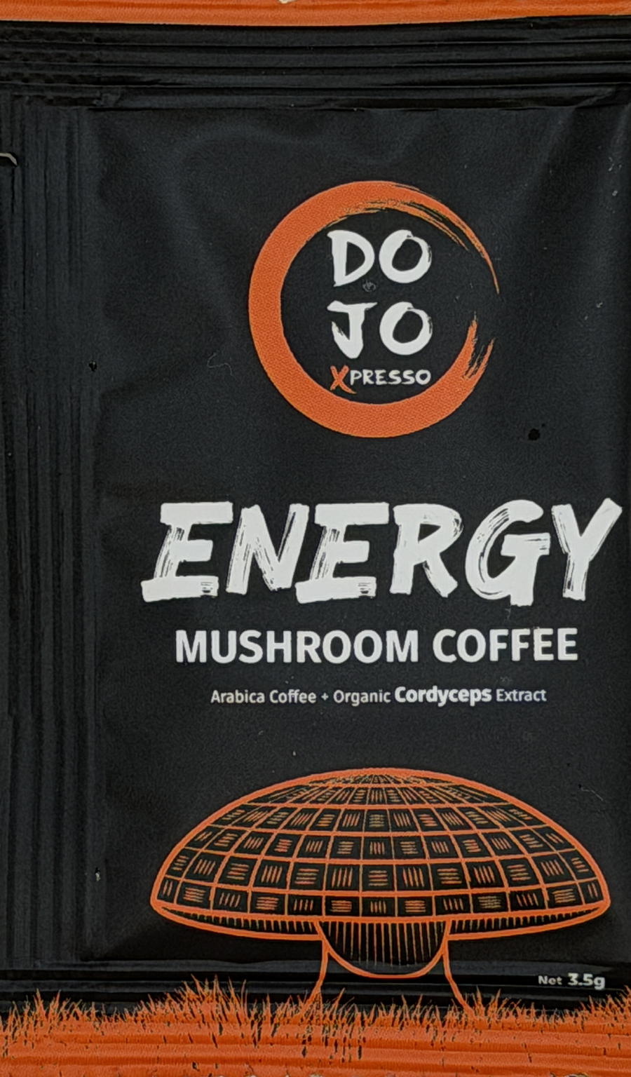DOJO Energy single-serve mushroom coffee sachet